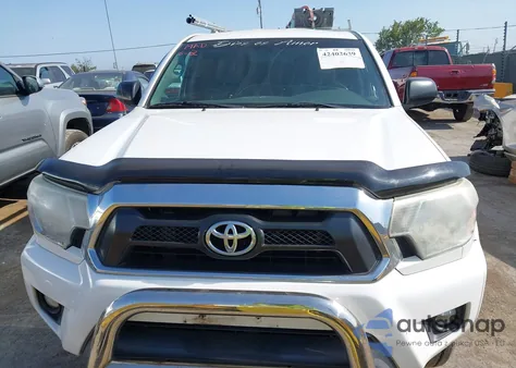2015 Toyota Tacoma Access Cab/Trd Pro z USA, uszkodzony, nr VIN 5TFUU4EN2FX123252
